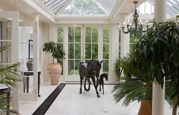 A more modern orangery with floor grilles providing heating.