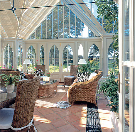 A traditional conservatory being used as a plant room, heated with underfloor heating.